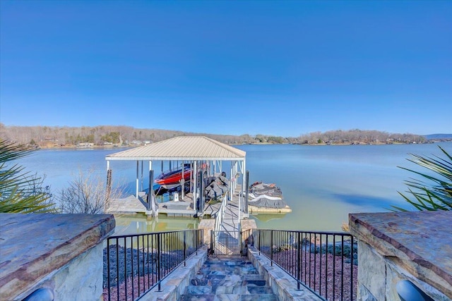 dock area featuring a water view