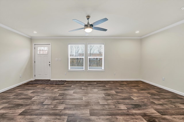 entryway featuring ornamental molding, dark wood-type flooring, and ceiling fan