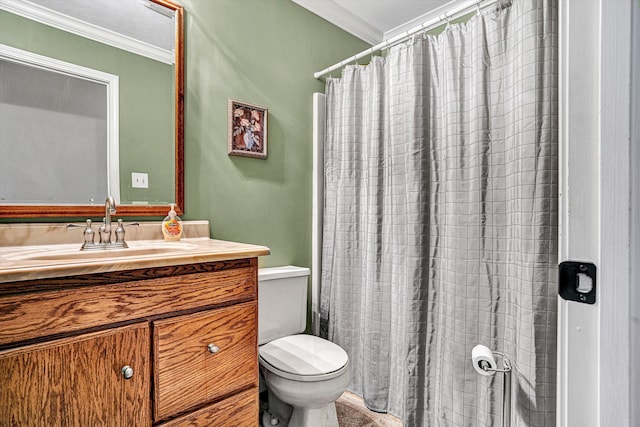 bathroom featuring vanity, crown molding, toilet, and walk in shower