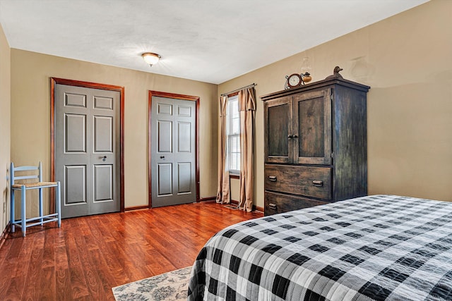 bedroom featuring dark hardwood / wood-style flooring