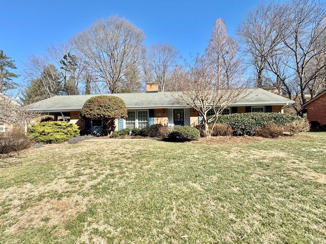 ranch-style house with a front yard