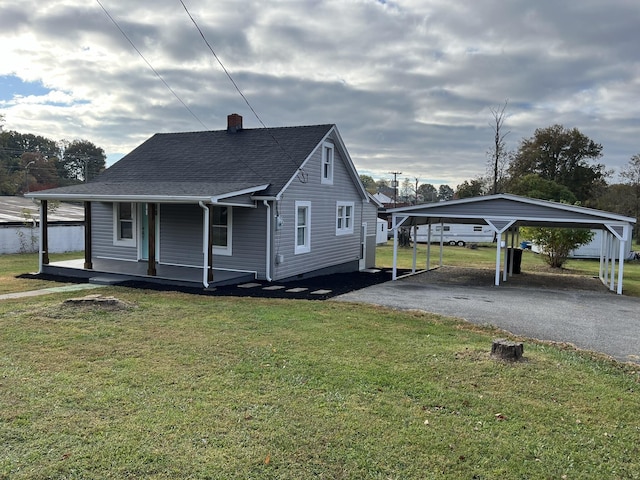 bungalow featuring a porch and a front lawn