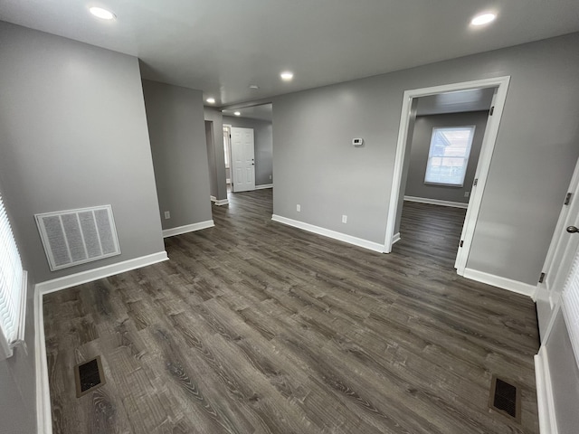 interior space with dark wood-type flooring