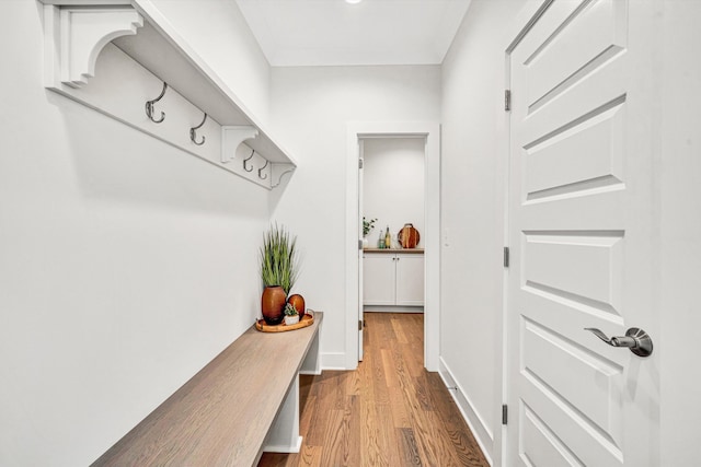 mudroom with wood finished floors