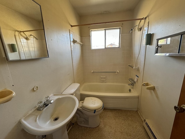 full bathroom with sink, a baseboard radiator, toilet, and tiled shower / bath