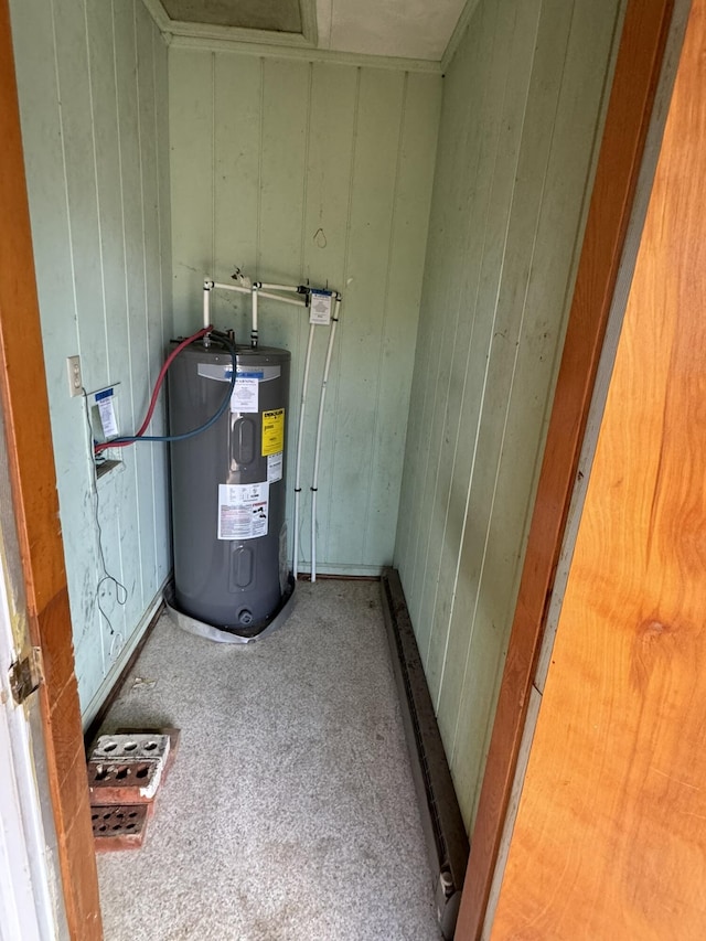 utility room with water heater