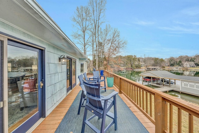 wooden deck with a water view