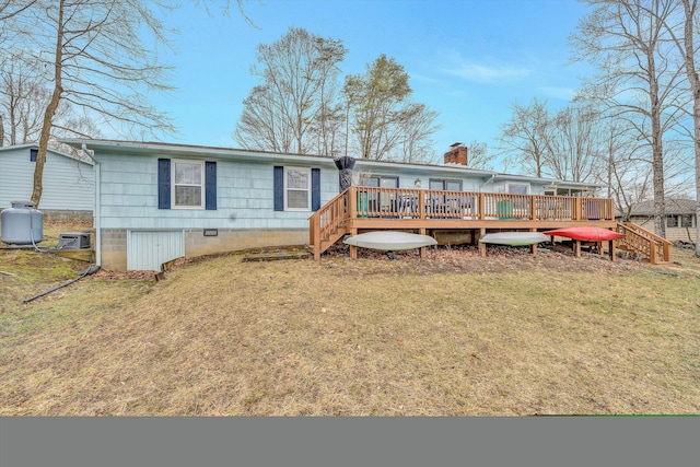 view of yard featuring an outdoor fire pit, a boat dock, and a water view