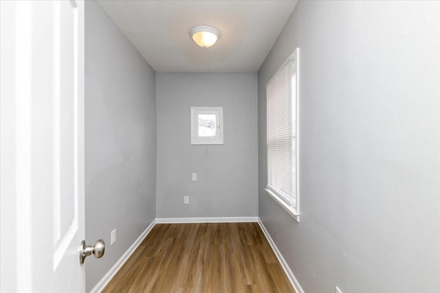 spare room with wood-type flooring