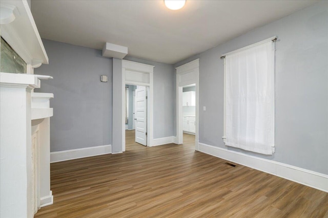 spare room featuring hardwood / wood-style floors