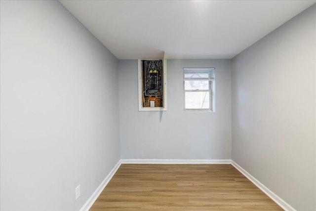 spare room featuring light hardwood / wood-style floors