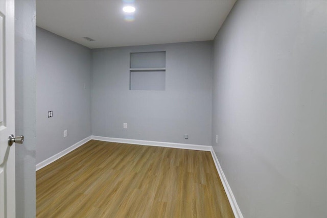 unfurnished room featuring light hardwood / wood-style floors