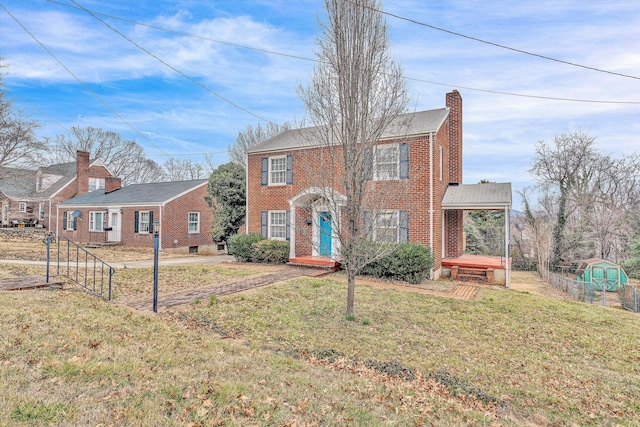 view of front of home with a front yard