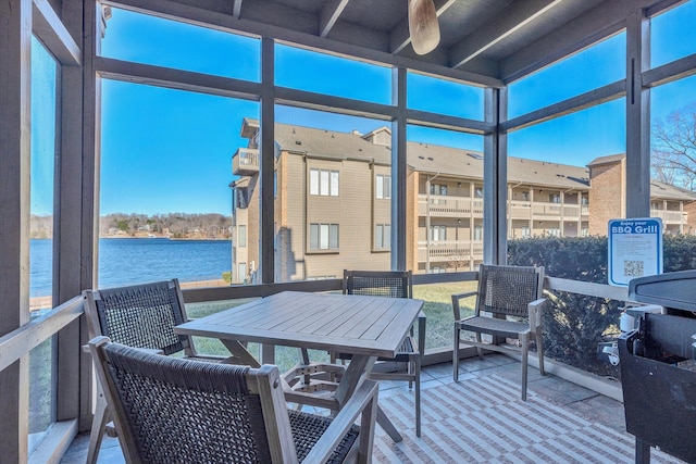 sunroom with a water view