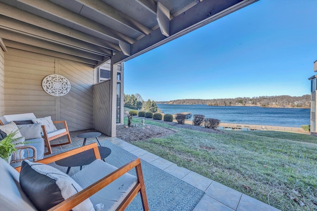 view of patio / terrace with a water view