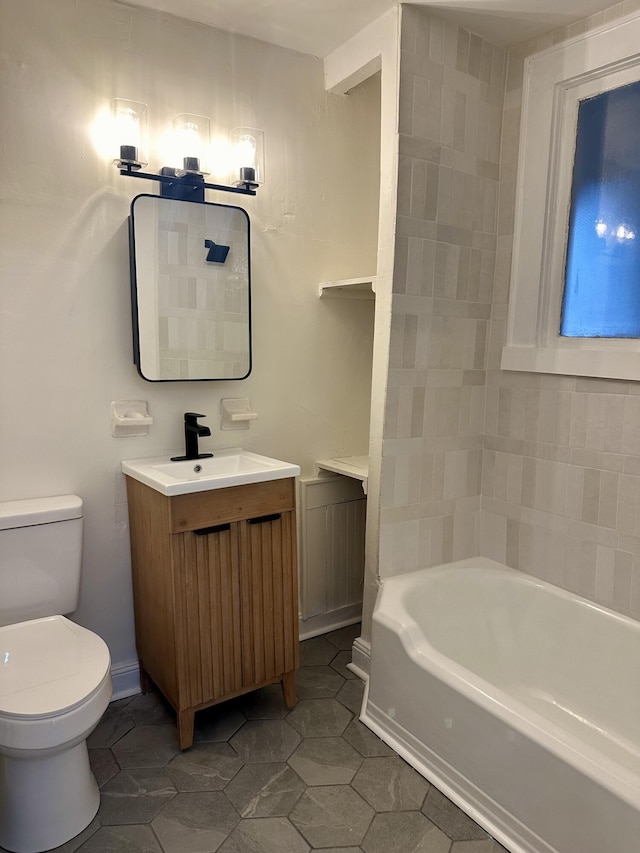 full bathroom with vanity, toilet, and tile patterned floors