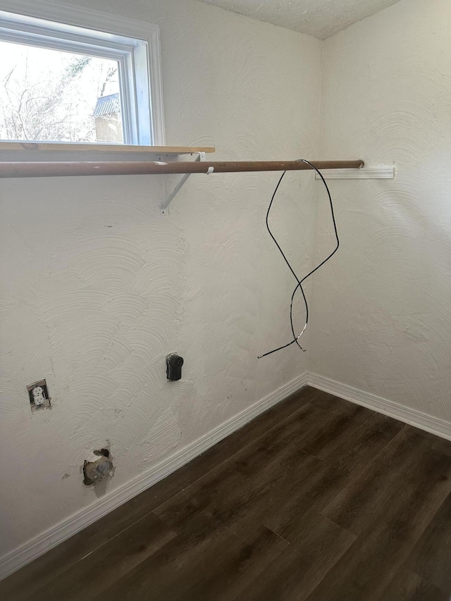 washroom with wood-type flooring