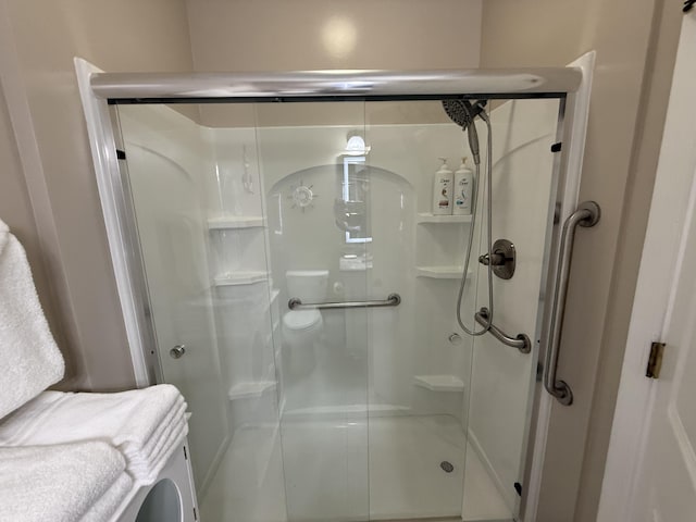 full bathroom with a shower stall