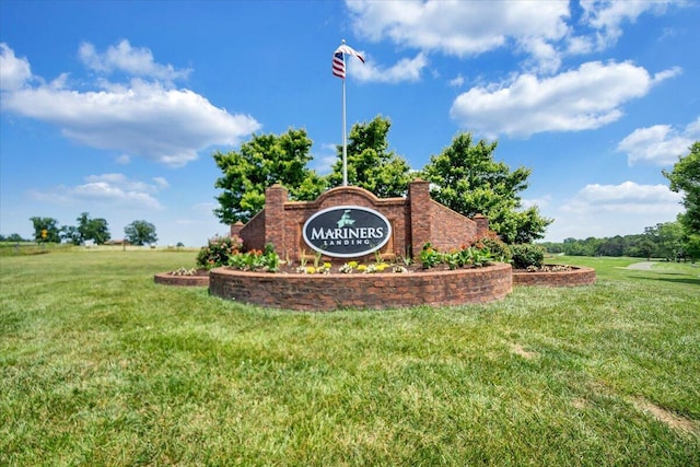 community sign with a lawn