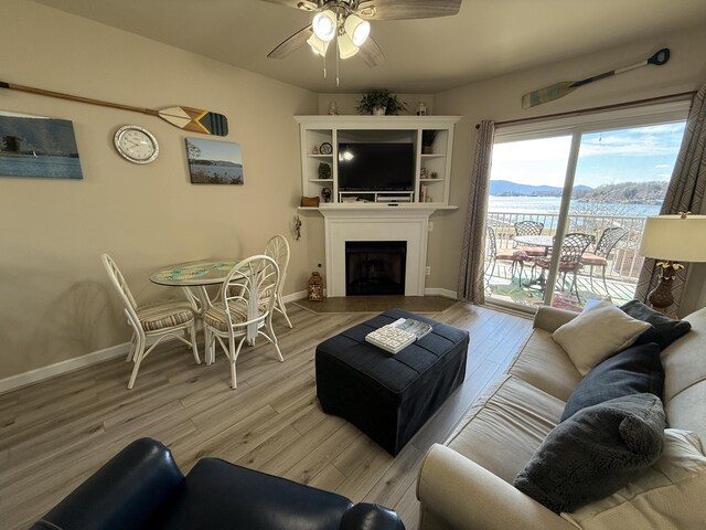 bedroom featuring ceiling fan and light hardwood / wood-style floors