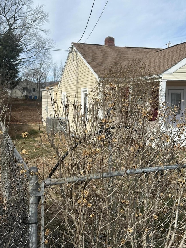 view of property exterior with cooling unit