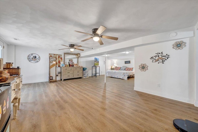 bedroom with light hardwood / wood-style floors