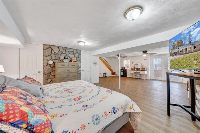 bedroom with hardwood / wood-style flooring