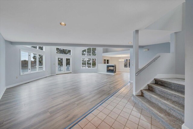 unfurnished living room with light wood-type flooring