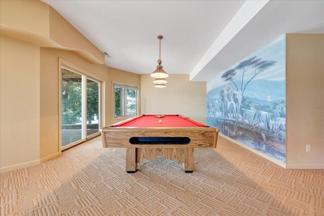 playroom with pool table and light colored carpet