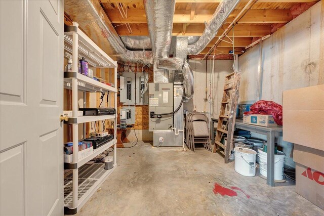 basement featuring heating unit