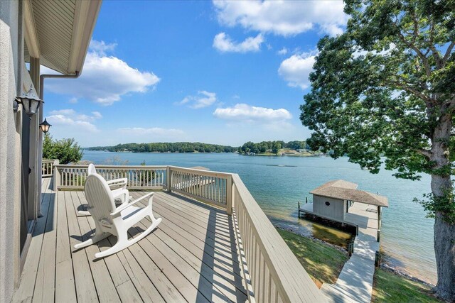 dock area with a water view