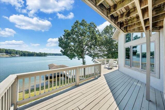 deck featuring a water view