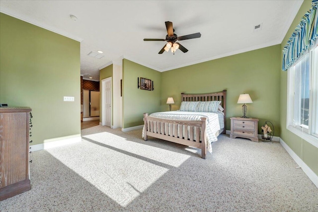 bedroom with crown molding, light colored carpet, and ceiling fan