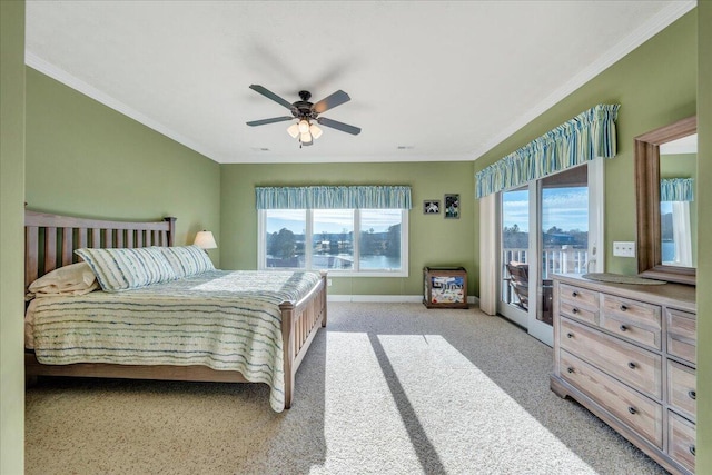 bedroom with ceiling fan, ornamental molding, and multiple windows