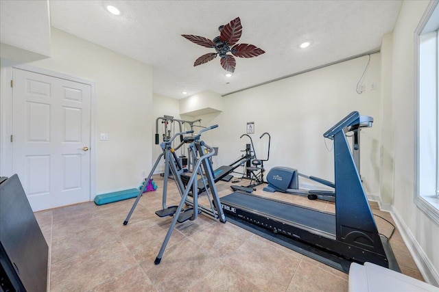 workout room featuring ceiling fan