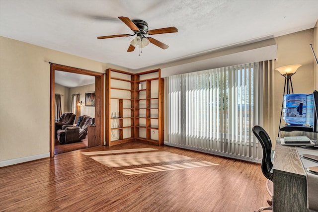 office area featuring hardwood / wood-style flooring and ceiling fan