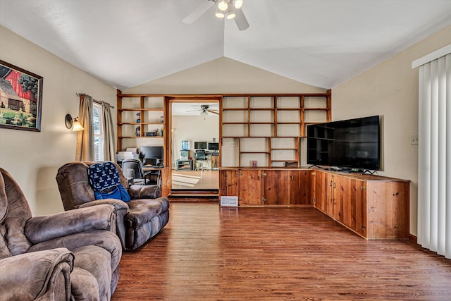 living room with wood-type flooring, lofted ceiling, and ceiling fan