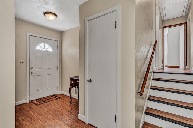 entrance foyer featuring hardwood / wood-style flooring