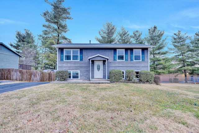 bi-level home featuring a front yard