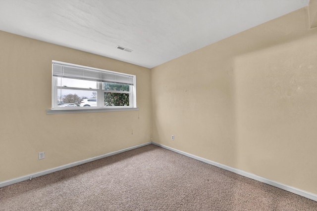 view of carpeted spare room