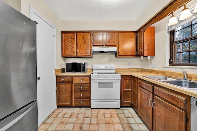 kitchen featuring sink and appliances with stainless steel finishes