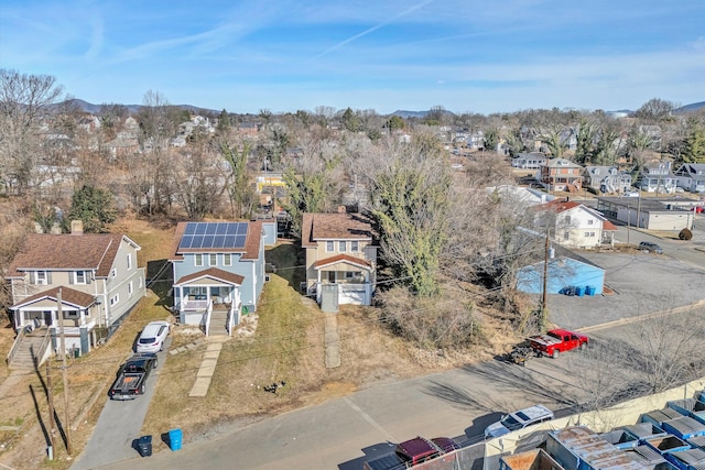 aerial view of residential area with a mountain backdrop