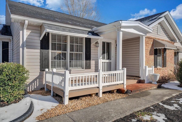 view of home's exterior featuring a porch