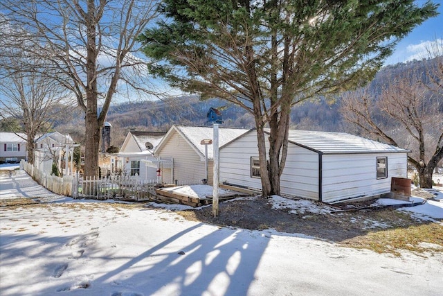 exterior space featuring a mountain view