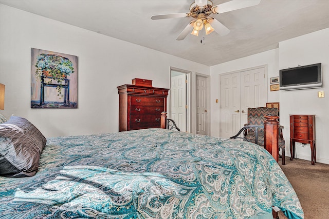 bedroom featuring carpet, ceiling fan, and a closet