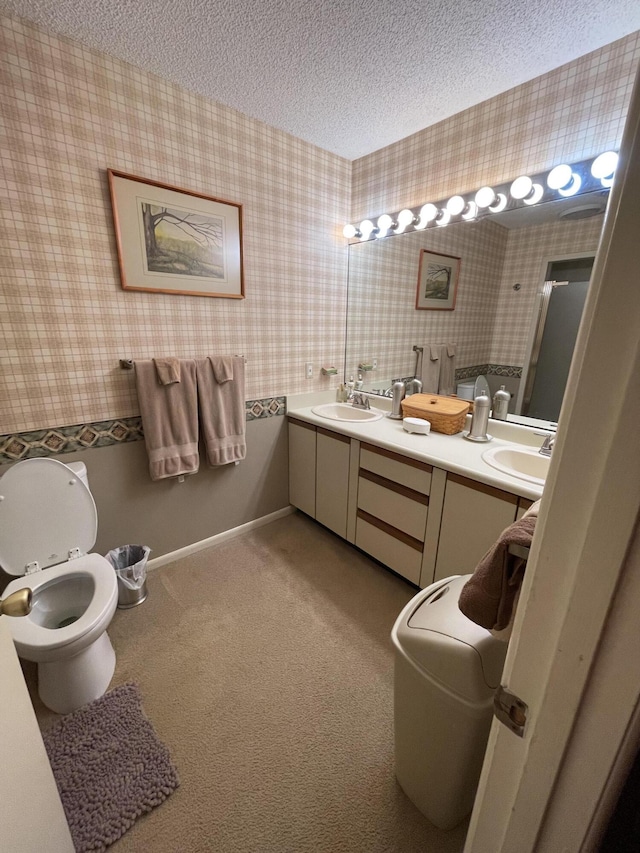 bathroom featuring vanity and a textured ceiling