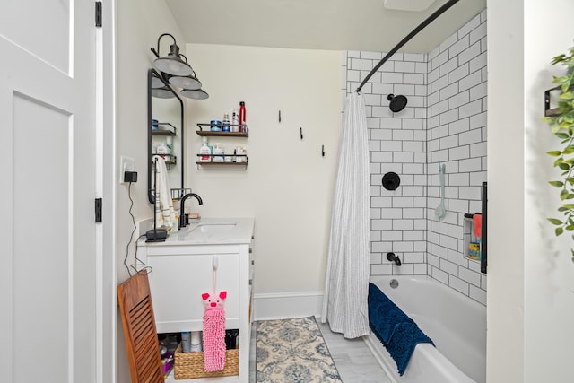 bathroom with vanity, hardwood / wood-style flooring, and shower / bath combo with shower curtain