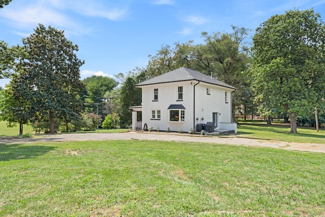 exterior space with a lawn