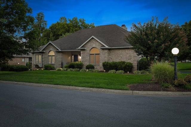 view of front of house with a front lawn