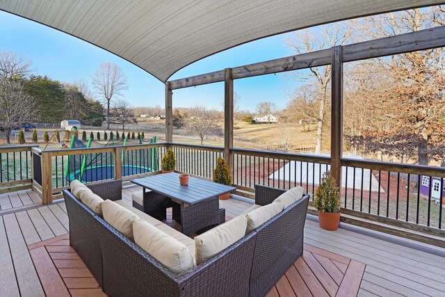 wooden deck featuring an outdoor living space